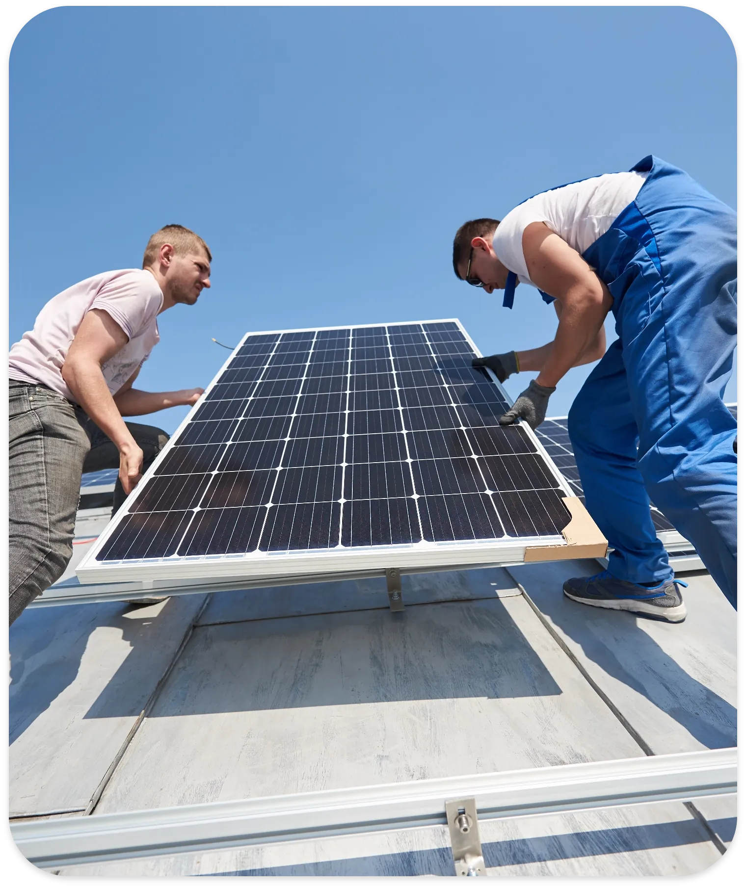 installing_solar_photovoltaic_panel_system_on_roof_2022_05_16_16_02_22_utc_2x_5aa311d869.webp